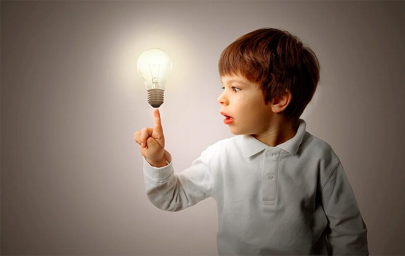 Boy with light bulb